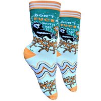 Don't F**k With Me Socks - Small. A pair of socks with a bold sweary slogan and trippy pattern of flowers and a skunk. Orange toes, heel and cuff. 