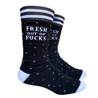 Fresh out of F**ks Socks. A pair of socks with a bold slogan and simple black and purple stars design. Purple toes, heel and cuff.