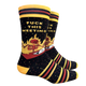 F**k This Meeting Socks - Large. A pair of socks with a cool burning skeleton motif and a bold sweary slogan. Yellow and red details.