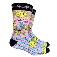 I'm A Ray Of F**king Sunshine Socks - Large. A pair of socks with a psychedelic sun shine pattern in bright blue and pink. Black toes, heel and cuff. 