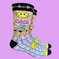 A pair of socks with a psychedelic sun shine pattern in bright blue and pink. Black toes, heel and cuff.