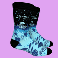 A blue and black pair of socks with a skeleton and the slogan Losing My S**t on the ankle. Black heel, toe and cuff.