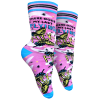 Last Flying F**k Socks - Small. A pair of socks with a bold slogan and a pink and yellow butterfly motif. Bright blue heel, toe and cuff.