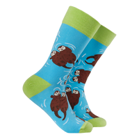 Sock with otter design on a blue background