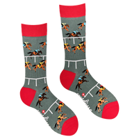 A pair of socks depicting horse racing. Grey legs, red cuff and, heel and toe.